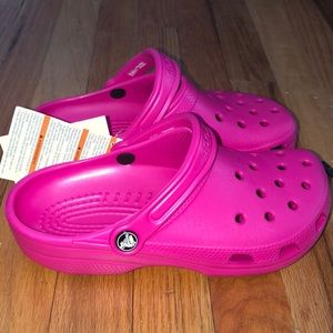 Brand new classic pink Crocs never been worn